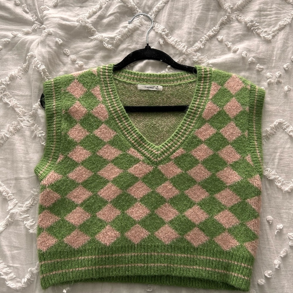 The cropped knit sweater vest